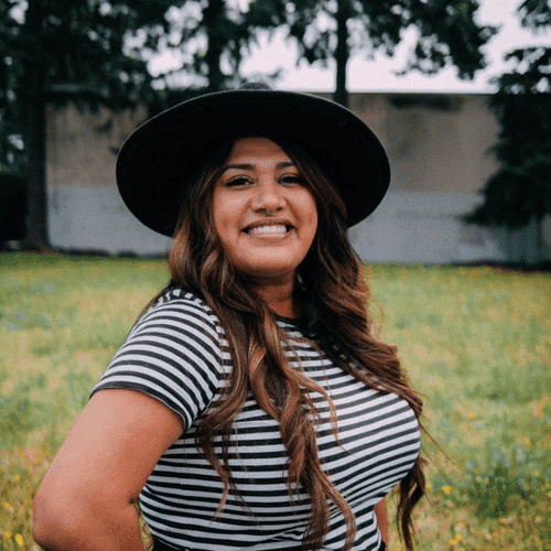 Portrait of Kristal Hoppe, a professional stylist at Hair Lounge, showcasing their expertise and style.